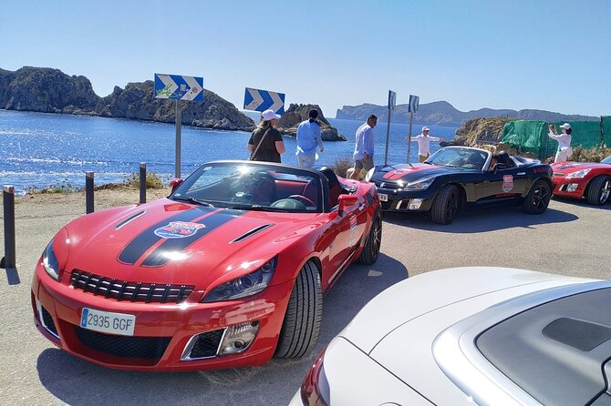 2.5h excursion through Mallorca Driving GT Cabrio Car - Puerto Portals brings a polished marina pause