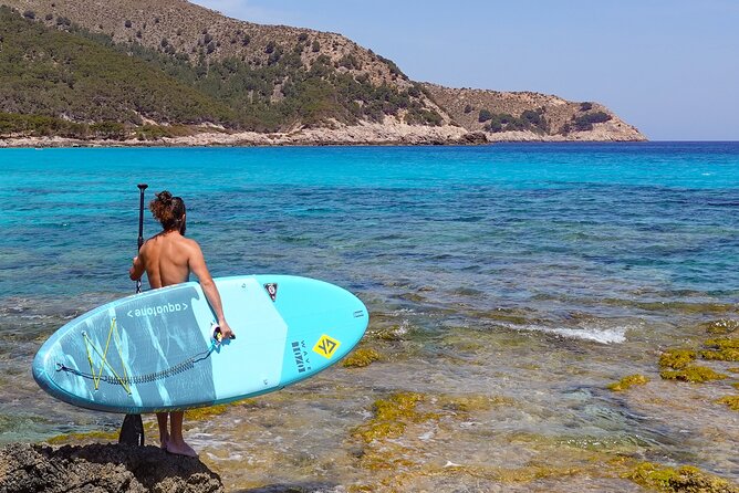90' Stand Up Paddle tour in a small group in Cala Ratjada - The coast looks better from a paddleboard