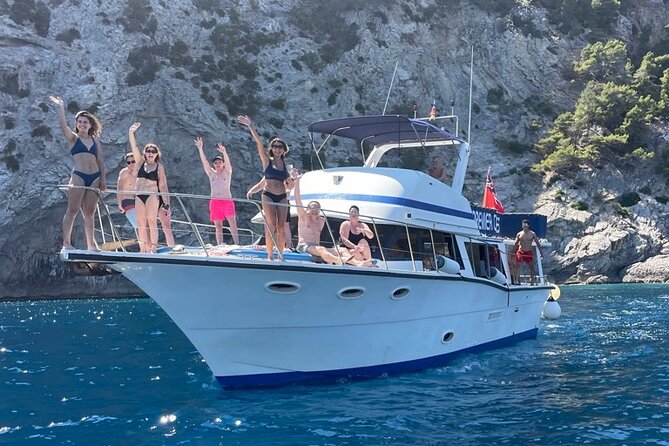 Alcudia 3hr Sunset Trip with Drinks, Tapas, SUP & Snorkel - Cliff sides, caves, and the northern Mallorca view