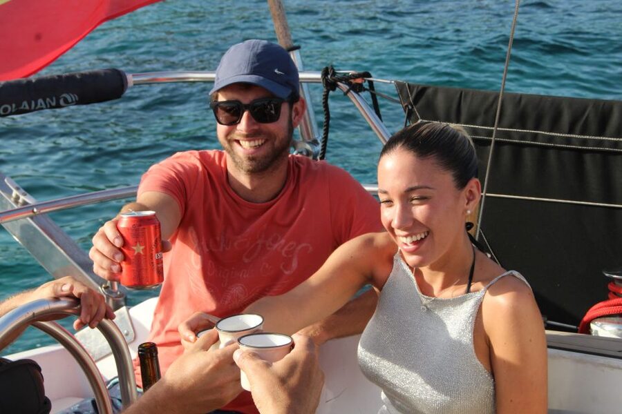 Alcudia: Private Sunset Boat Trip with Glass of Wine & Snack - Watching the sun set over the bay