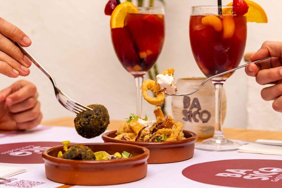 Alcudia: Self-Guided Gourmet Tapas and Wine Tour - Four small plates, one easy walk through Alcudia