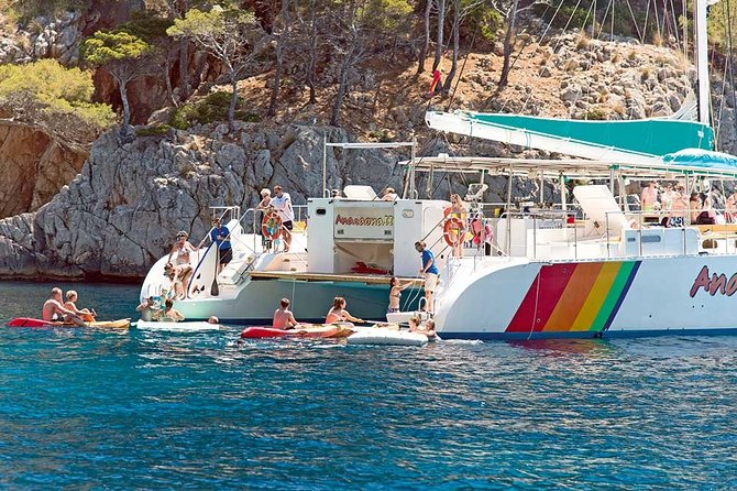 Catamaran Cruise from Port d'Alcudia with Lunch and Swim Stop - Aucanada lighthouse and the north coast