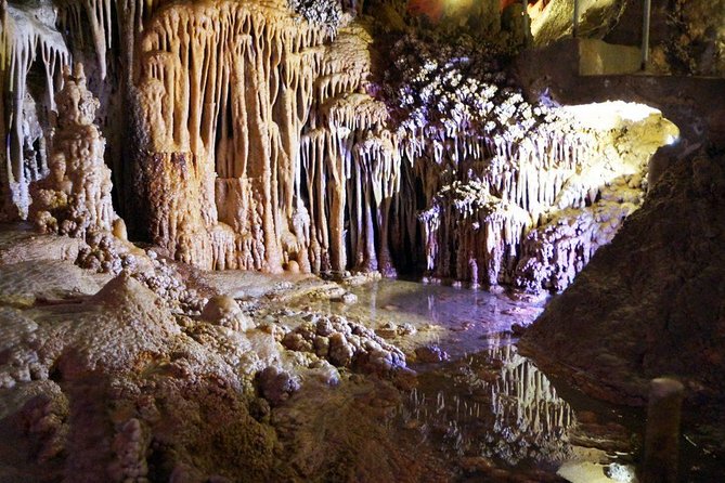 Caves of Genova Admission in Palma de Mallorca - Climbing down into the Cuevas de Genova