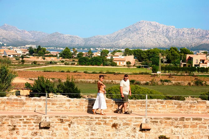 Discover Alcudia old town on a private walking tour - Walking the medieval walls above Alcudia