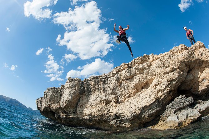 East Mallorca Coasteering Experience with Transfers - Getting into the wetsuit and safety gear