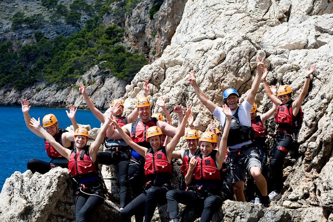 East Mallorca Coasteering Experience with Transfers - Starting with a 6.5-foot jump