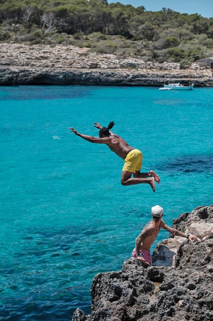 Experinence Cala Agulla / Molto with Paddlesurf and snorkel - Cala Agulla, pine woods and open golden sand
