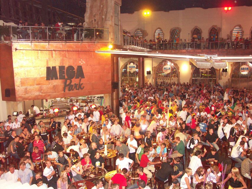 From Can Picafort: Ballermann Night Tour by Bus - Bierstrasse, Ballermann 6, and the beach promenade