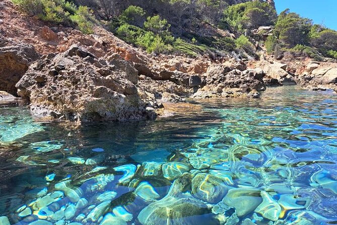 Guided Kayak Tour from Sant Elm to Sa Dragonera - Swimming and snorkeling in the island cove