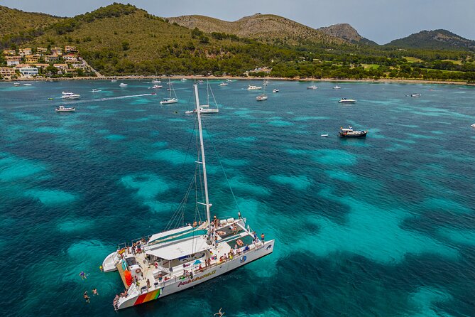 Mallorca Catamaran Cruise with Scenic Views and BBQ Lunch - Coll Baix, the first swim in a hard-to-reach cove