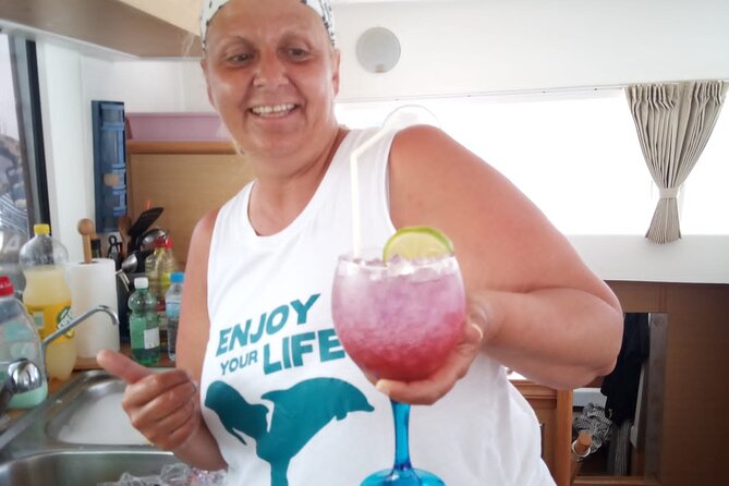 Mallorca Catamaran Small Group Cruise with Tapas 4-hours - Cocktails, Mocktails, and Extra Costs