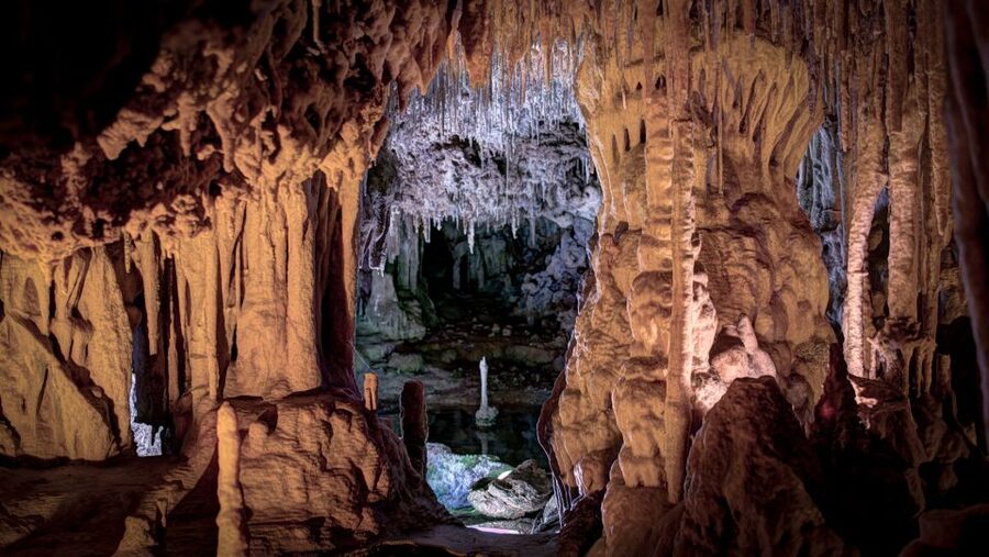 Mallorca: Caves of Hams and Dinosaurland Ticket with Pickup - Entering Cueva Redonda and the Caves of Hams