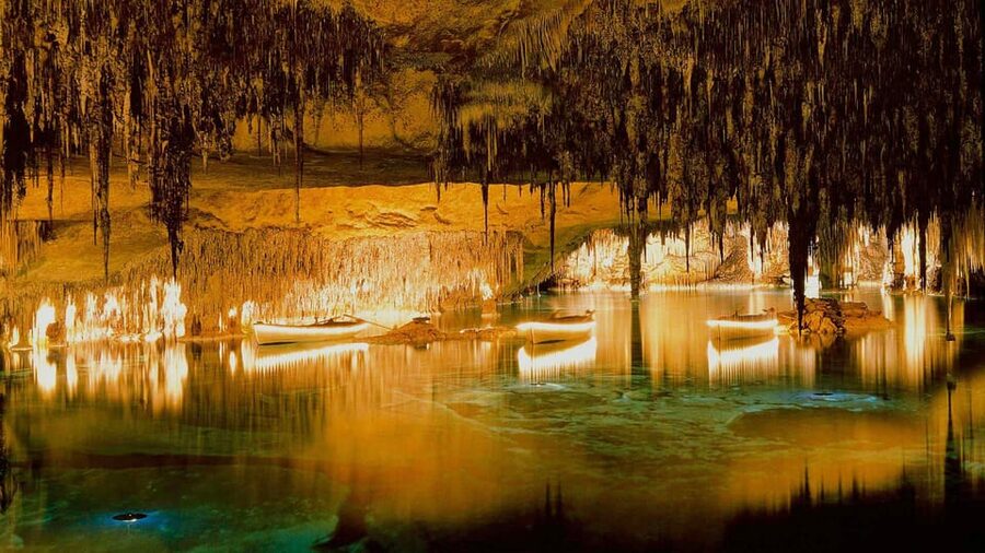 Mallorca: Drach and Hams Caves, and Porto Cristo Day Tour - Hams Caves and the blue Venetian Lake