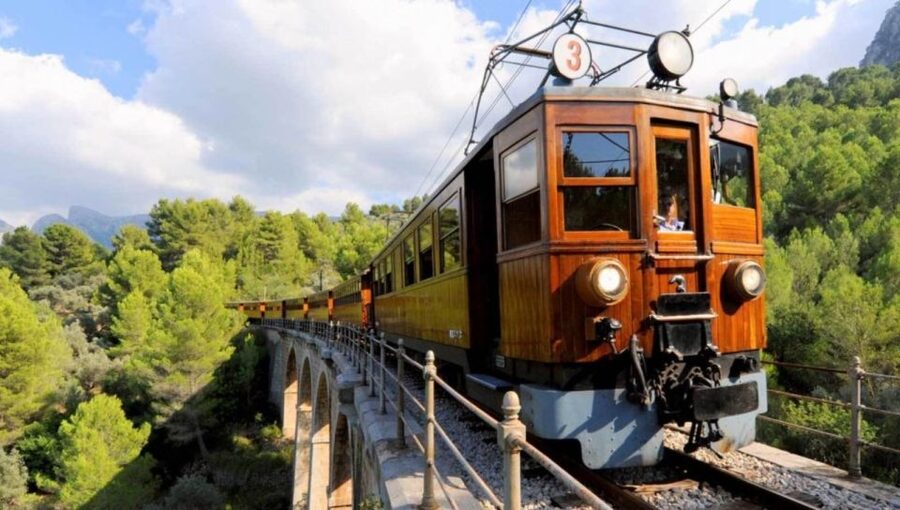 Mallorca: Island Tour with Boat, Train, and Hotel Transfer - The wooden tram through the Sóller valley