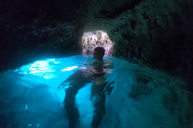 Mallorca: Kayaking, Sea Cave, Cliff Jumping & Snorkel Tour - Paddling toward the marine cave