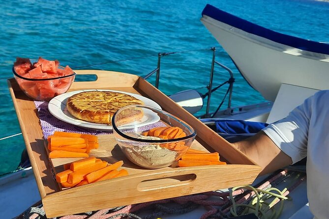 Mallorca Sailing Adventure with Snorkeling, Snacks & Drinks - Tapas, drinks, and what you actually eat