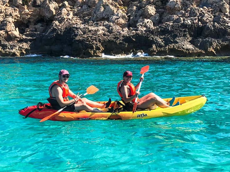 Mallorca: Sea Cave Kayaking Tour with Snorkeling and a Snack - Swimming and snorkeling in clear water