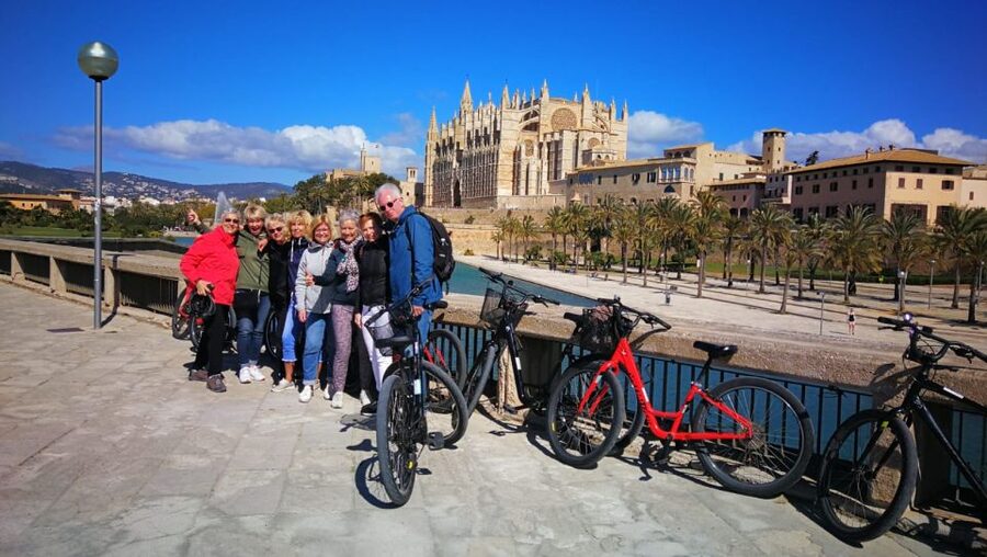 Palma de Mallorca: Guided Bicycle Tour - Entering Palma’s old town through narrow lanes