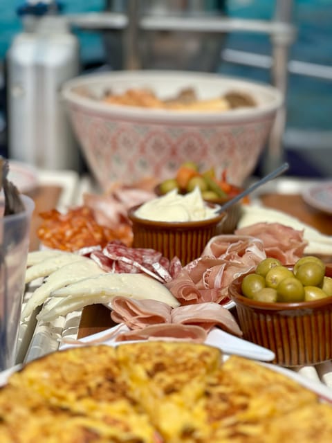 Palma de Mallorca: Sailing Boat Trip with Skipper & Tapas - Setting sail from Real Club Nautico de Palma