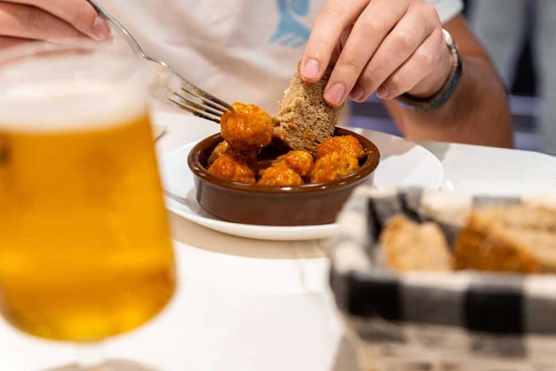 Palma de Mallorca: Traditional Mallorcan Food Tour - A 10-minute walk to Mercado del Olivar