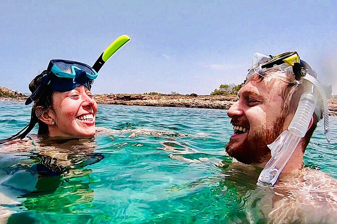 Private Boat Tour from Palma with Snorkeling and Paddle Surfing - Paddle surfing with time to swim