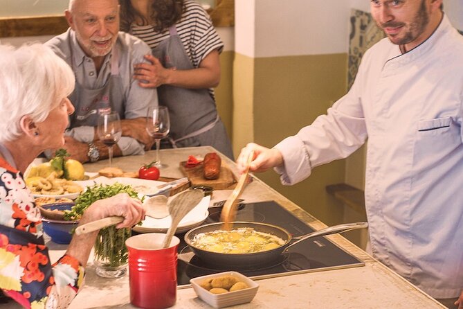 Spanish Cooking Experience in Mallorca - Making crema catalana before sitting down to eat
